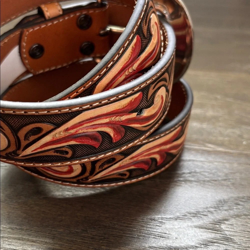 Ariat Genuine Leather floral embossed w/red accent,silvertone floral buckle